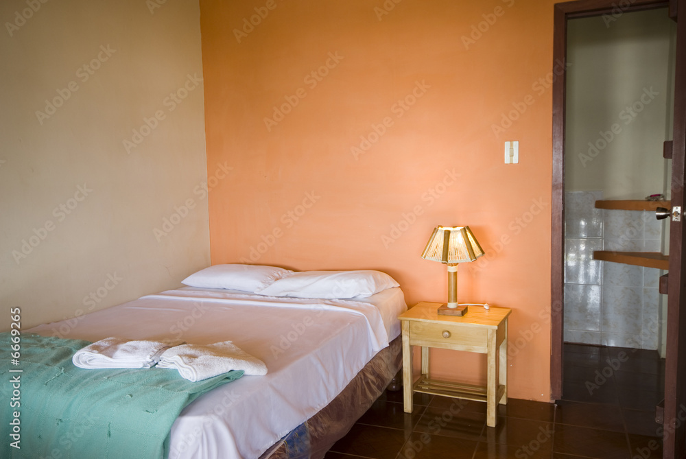 A cheap hotel room interior
